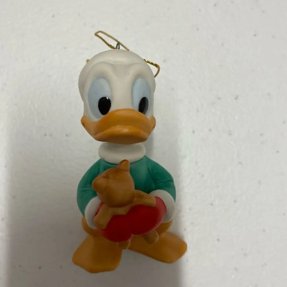 Disney Donal duck Santa holding teddy bear porcelain ornament